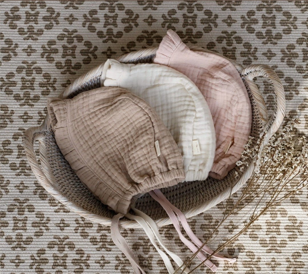 Cream ruffled bonnet