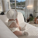Cream ruffled bonnet