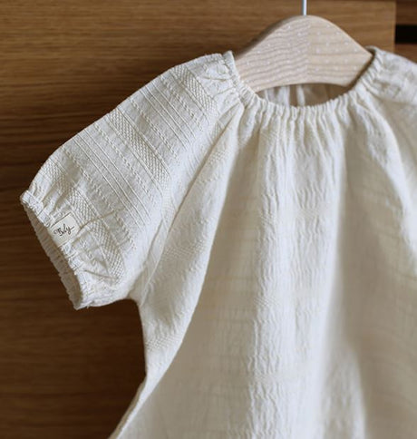 Blanc de Bodysuit